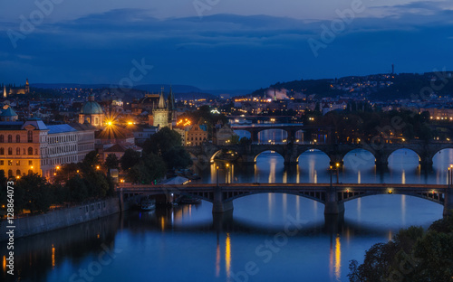 Evening view on Charles bridge over Vltava river in Prague capit