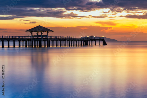 Summer  Travel  Vacation and Holiday concept - Wooden pier between sunset in Phuket  Thailand