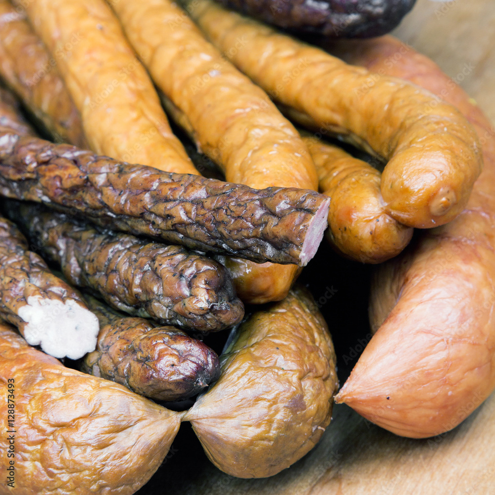 Fototapeta premium sausage on a wooden background