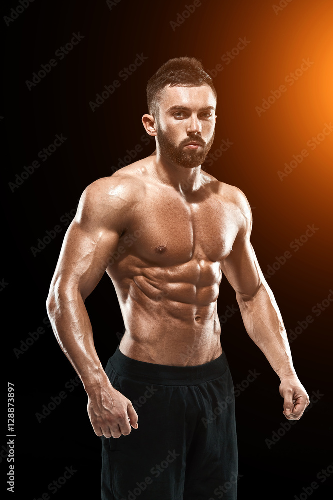 Muscular bodybuilder guy doing posing Muscular bodybuilder guy doing posing