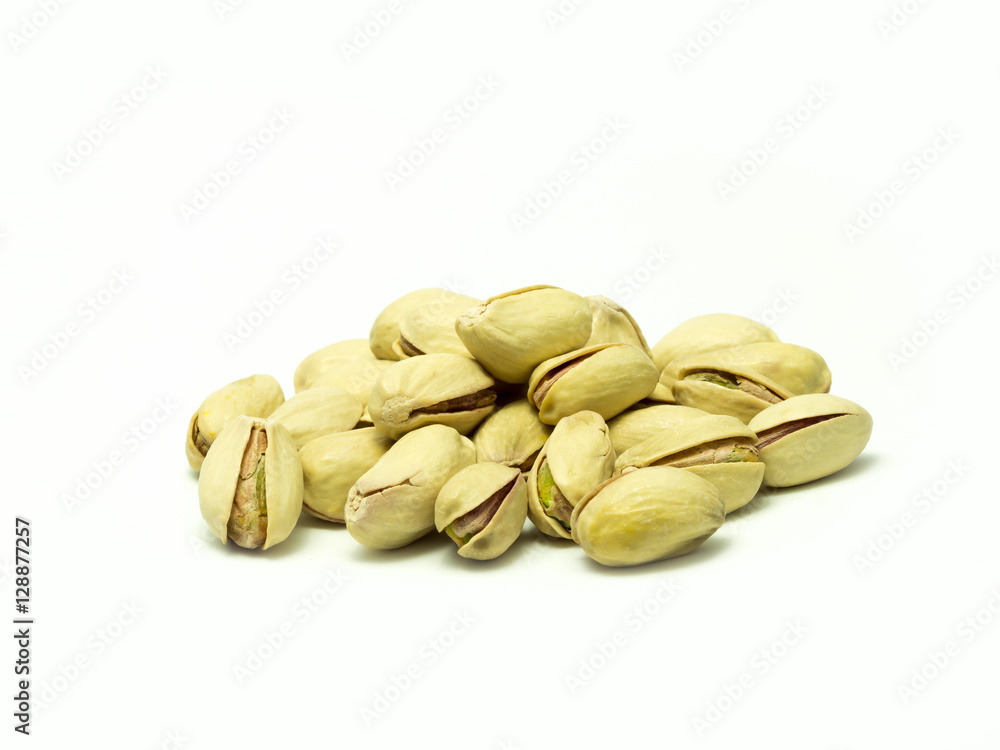 Pistachio nuts on a white background Pistachio nuts on a white background