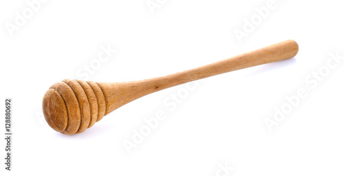 wooden honey stick isolated on white background