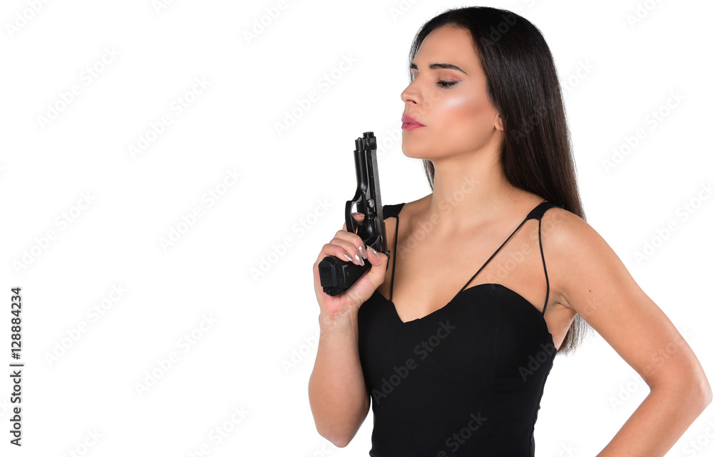 beautiful dangerous women holding a gun. isolated on white background beautiful dangerous women holding a gun. isolated on white background