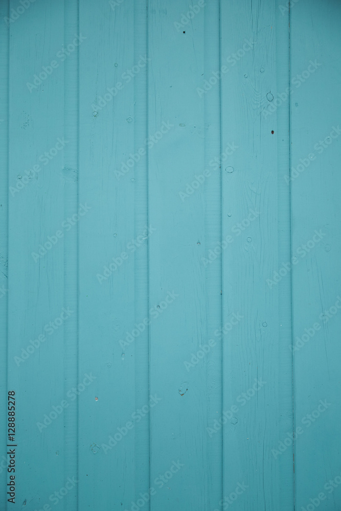 A full page of turquoise painted floor boards background texture A full page of turquoise painted floor boards background texture