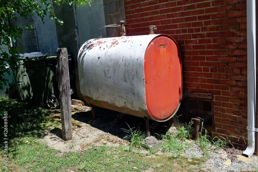Home heating oil tank. Outdoors. Horizontal. Home heating oil tank. Outdoors. Horizontal.