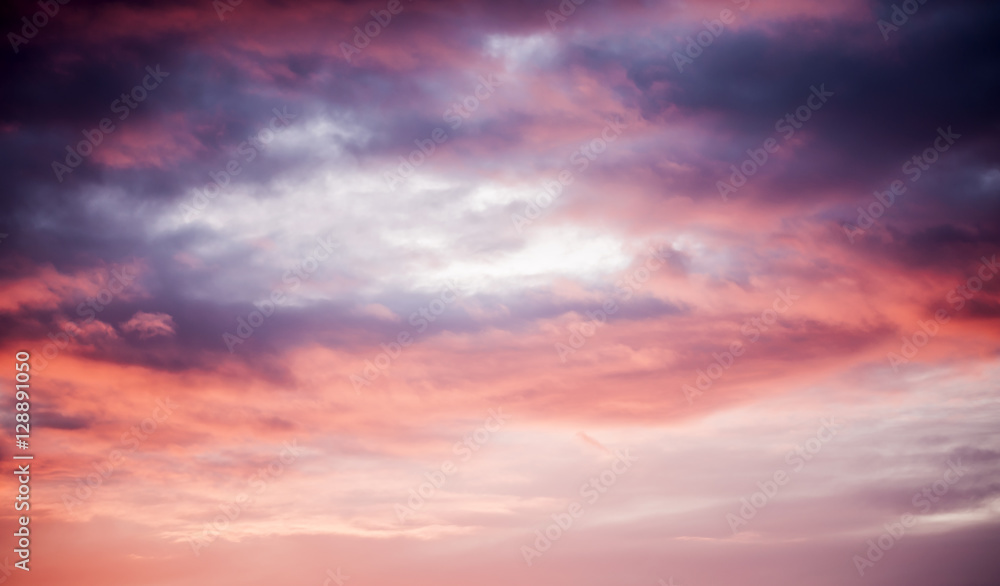Purple vibrant sunrise with clouds