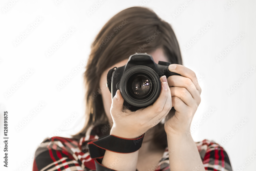 girl with camera on white background / photographer / cameraman / camerist girl with camera on white background / photographer / cameraman / camerist