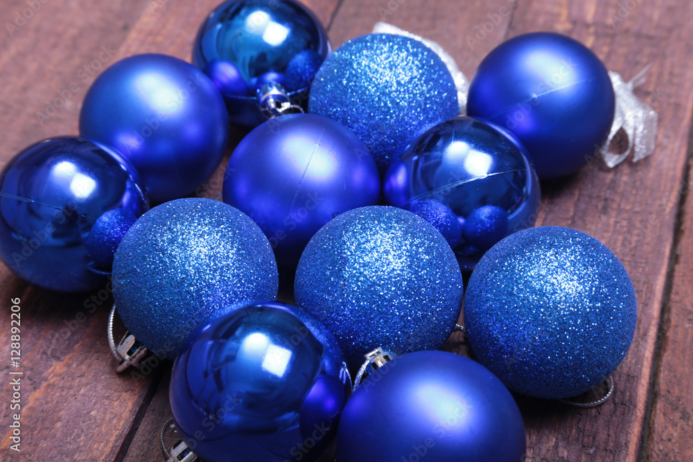 Blue christmas balls on a wooden background Blue christmas balls on a wooden background