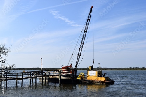 Wooden dock repair at hurricane Florida, USA