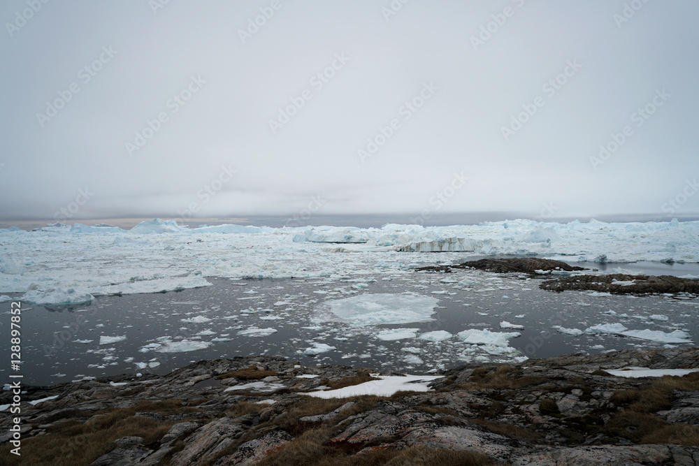 Scenic View Of Icebergs Against Sky Scenic View Of Icebergs Against Sky