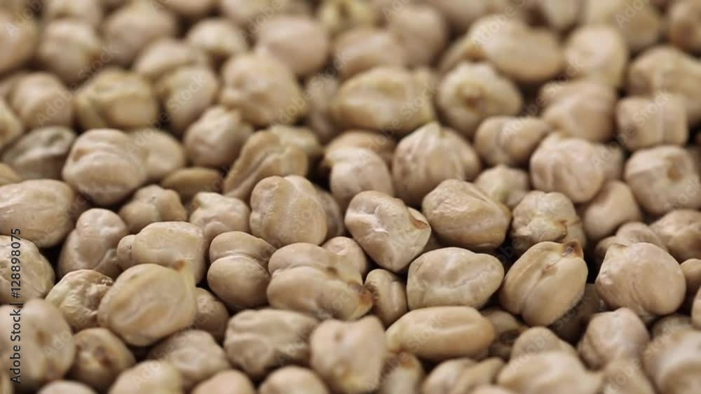 Rotating raw chickpea beans, vegan healthy nutrition. Slow Motion
Rotating raw chickpea beans, vegan healthy nutrition. Slow Motion