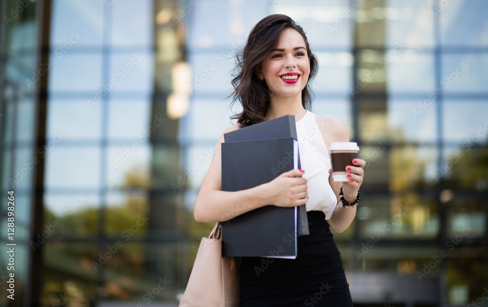 Businesswoman outdoors using phone