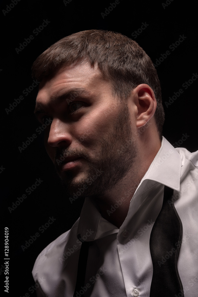 Gloomy man face in the dark Gloomy man face in the dark