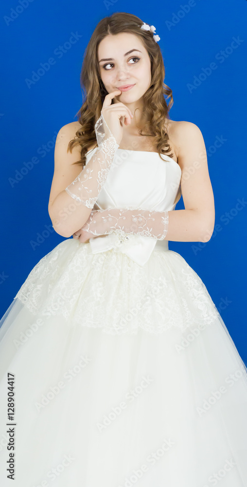 Fototapeta premium bride on blue background. dress