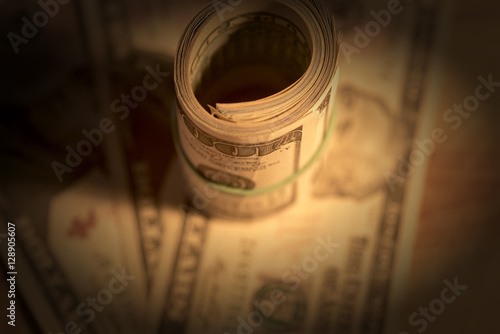  dollar bills tied with rubber band