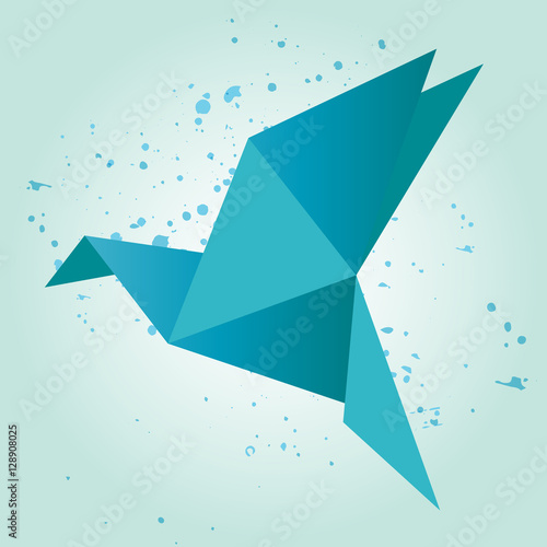 голубая птица оригами на красивом фоне  photo