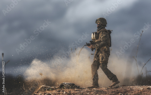 Soldier walking on the battlefield. It`s a doll.