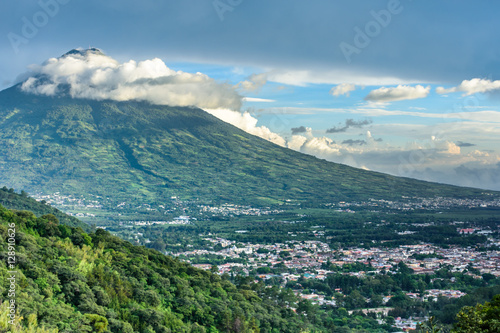 Agua volcano towers over Antigua, Guatemala, Central America