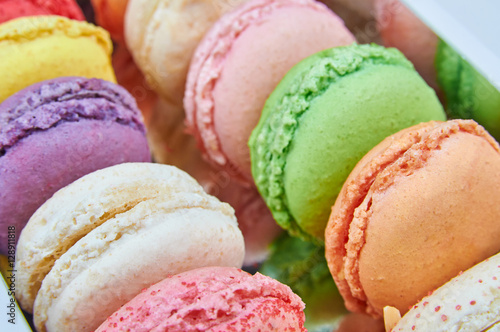 Colorful french macaroons in a box