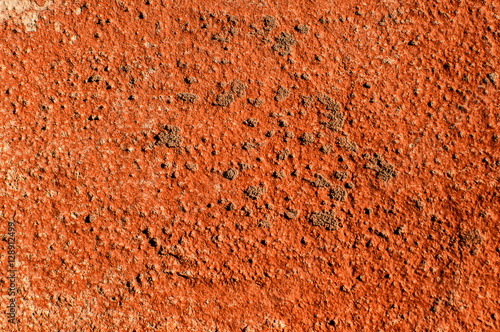 Texture of wall painted with red lead photo