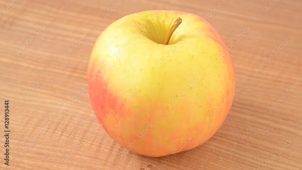Apples on a board. Shooting in the movement. Apples on a board. Shooting in the movement.