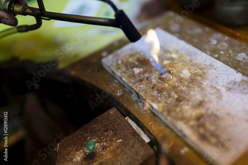 Goldsmith working on a ring