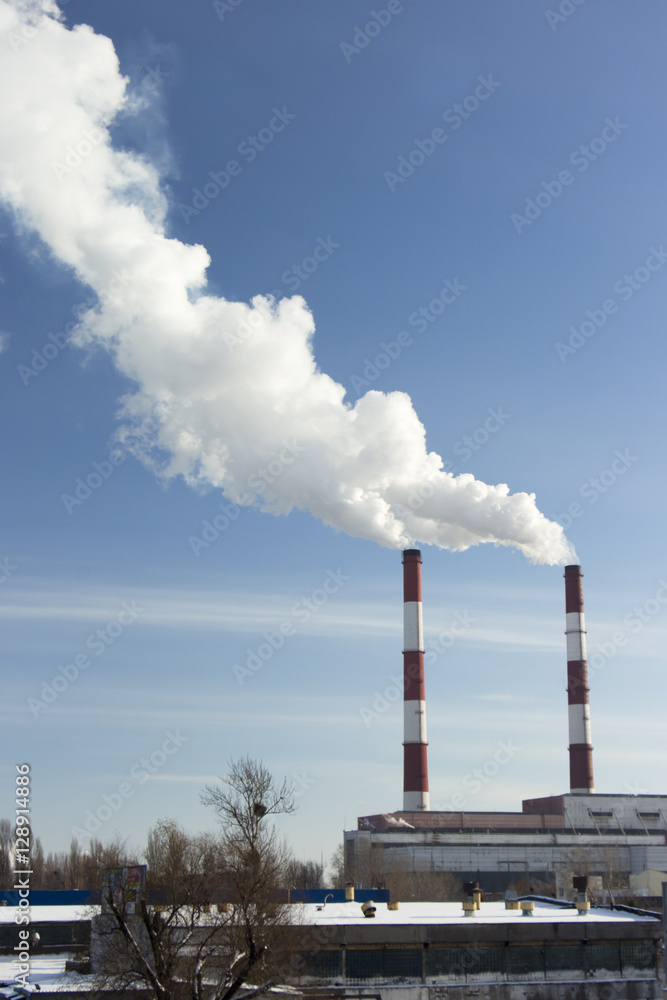 Thick smoke from factory chimneys. Pipe with smoke. Heat energy Thick smoke from factory chimneys. Pipe with smoke. Heat energy