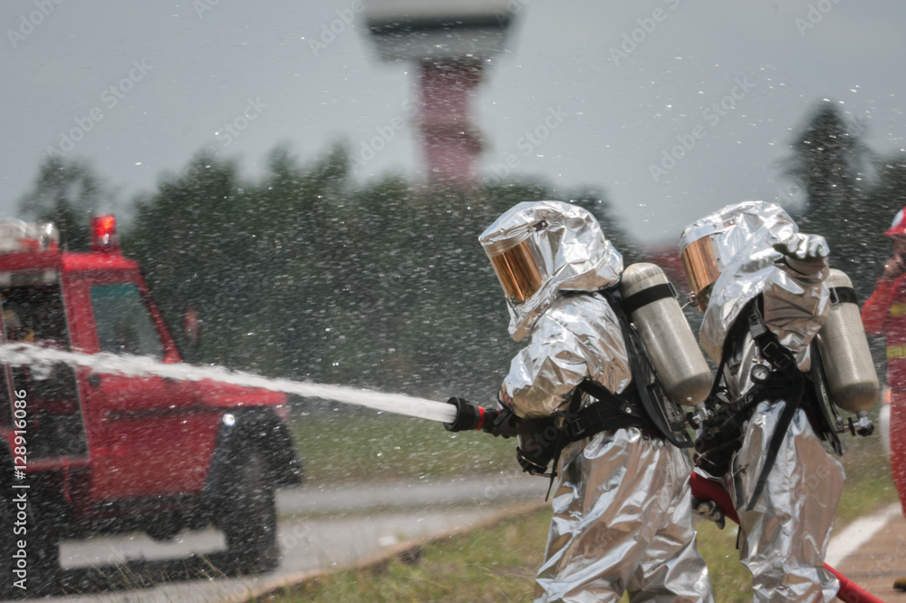 Fototapeta premium Fire departments & emergency response teams suited up with PPE t