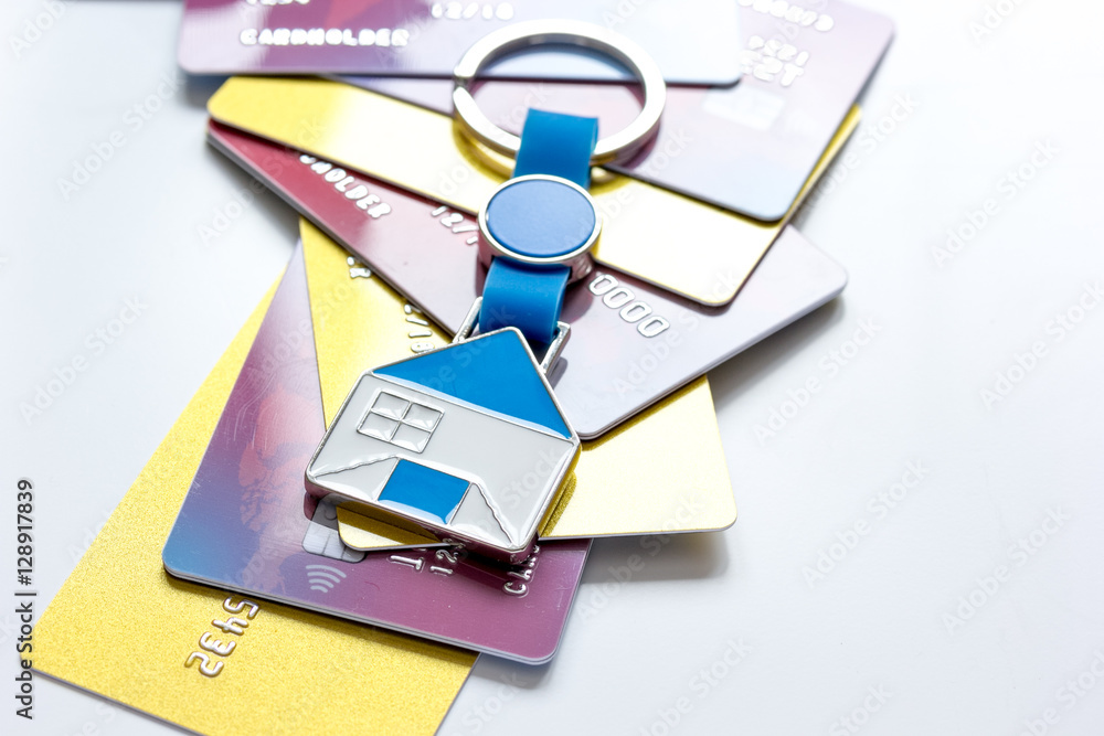 credit cards, key ring - concept mortgage on white background credit cards, key ring - concept mortgage on white background