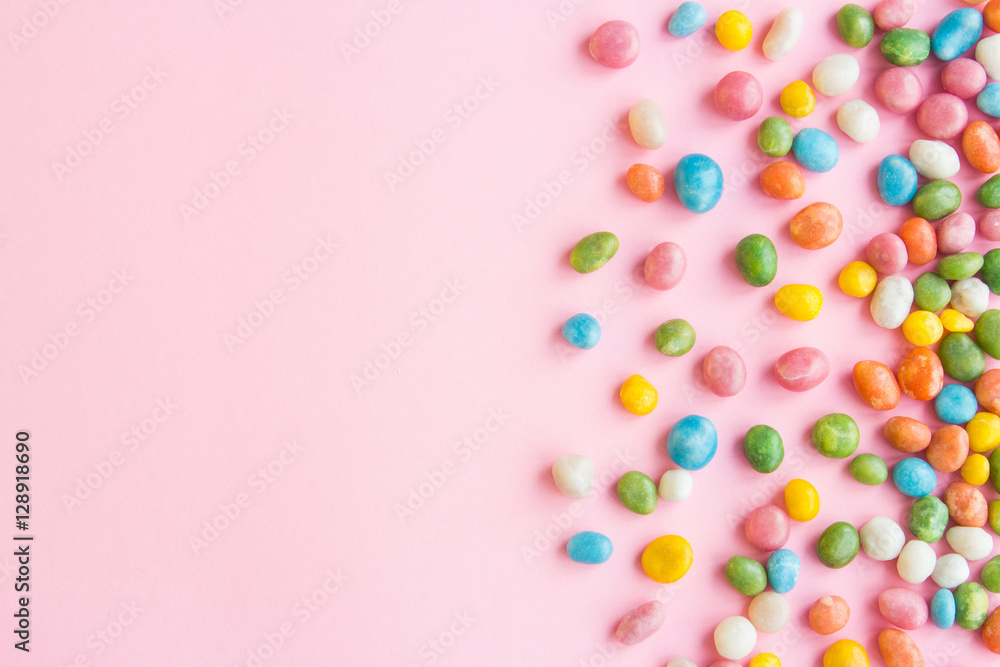 Sweets scattered on pink background Sweets scattered on pink background