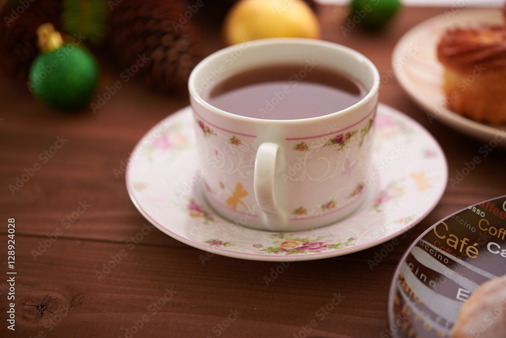 tea and sweets on a wooden table tea and sweets on a wooden table