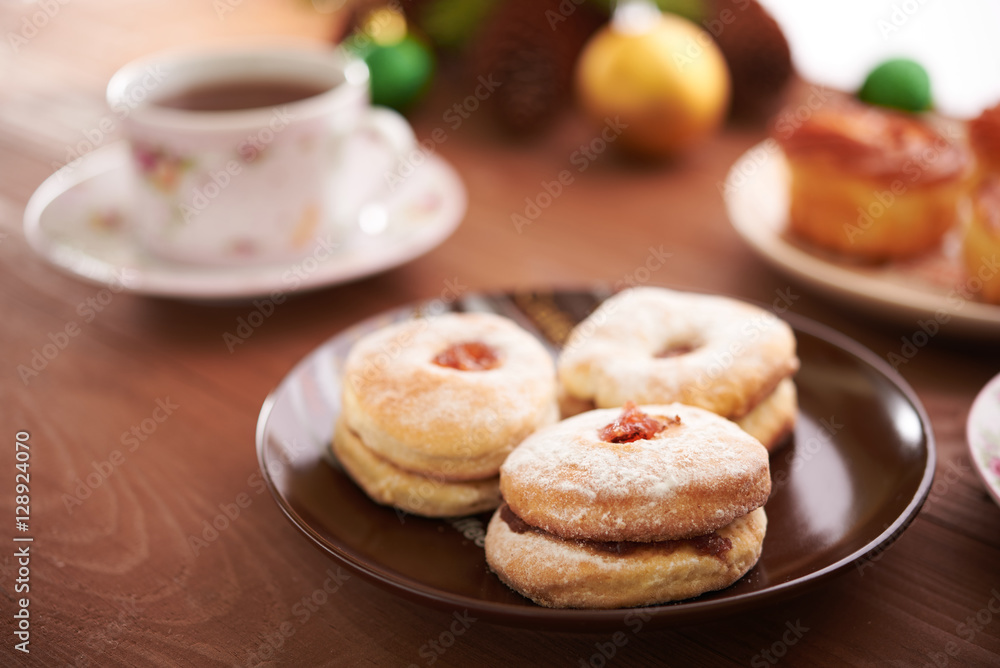 tea and sweets on a wooden table tea and sweets on a wooden table