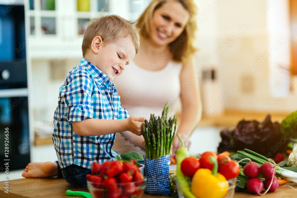 Mother and child preparing lunch