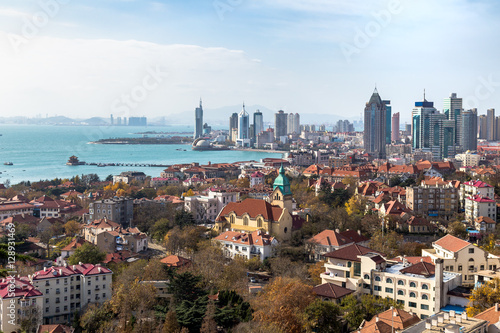 Qingdao Bay and the Lutheran church seen from the hill of Signal Park in Autumn, Qingdao, China