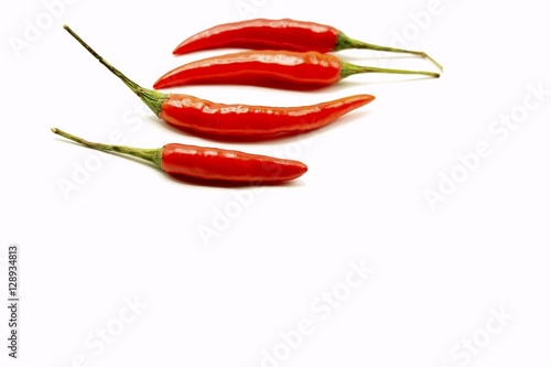 chilies pepper on white background,Chili pepper, the spicy fruit of plants in the genus Capsicum; sometimes spelled "chilli" in the UK and "chile" in the southwestern US.