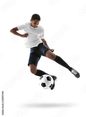 African-American youth football player on white background © Africa Studio