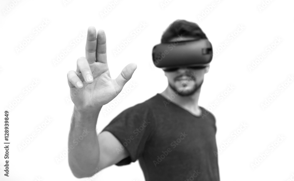 man in dark T-shirt wearing virtual reality 3D headset and exploring the play man in dark T-shirt wearing virtual reality 3D headset and exploring the play