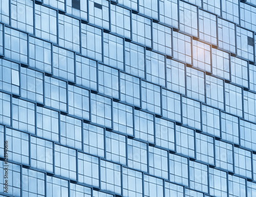 Contemporary office building blue glass wall detail