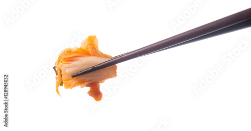 kimchi, korean traditional food with chopsticks isolated on whit