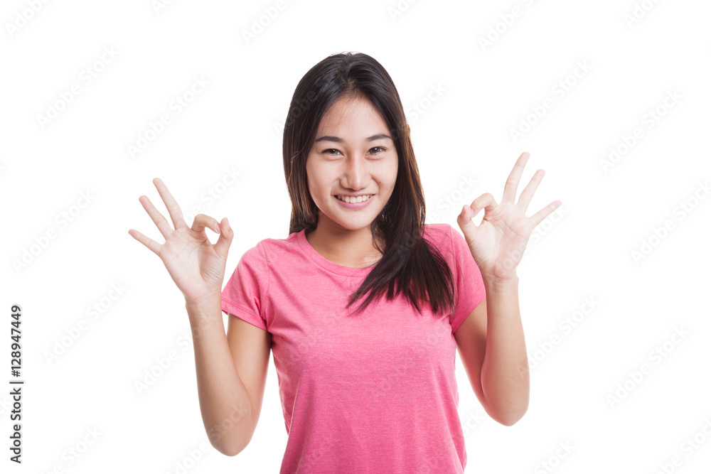 Asian woman show double OK hand sign and smile Asian woman show double OK hand sign and smile