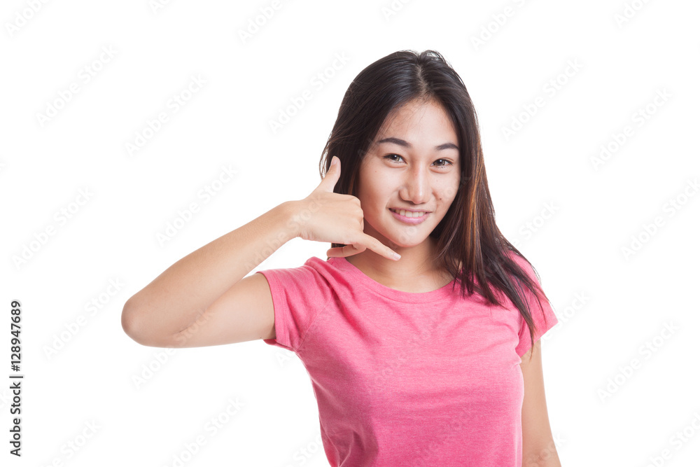 Young Asian woman show with phone gesture isolated on white background Young Asian woman show with phone gesture isolated on white background