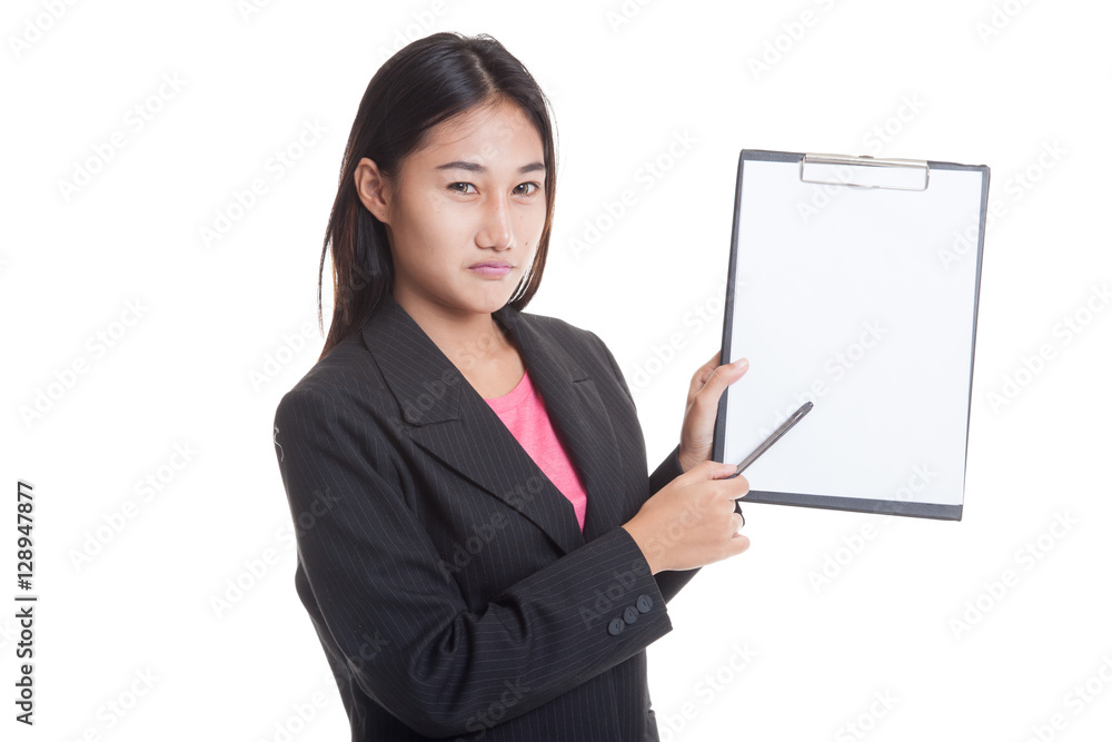 Unhappy Asian business woman point to clipboard with pen isolated on white background Unhappy Asian business woman point to clipboard with pen isolated on white background