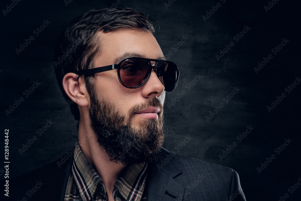 Fototapeta premium Close up portrait of bearded male in sunglasses.