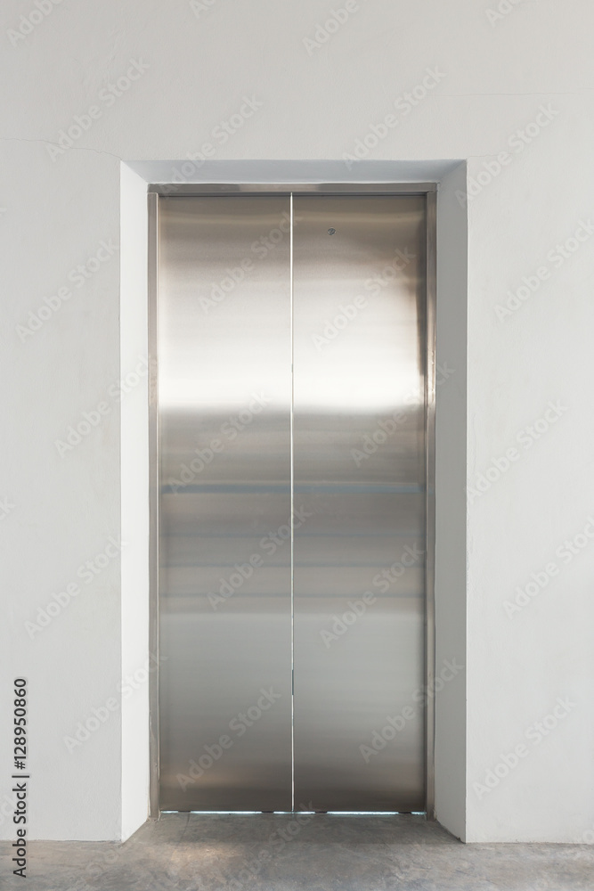 Elevator door or steel door inside office building. Elevator door or steel door inside office building.
