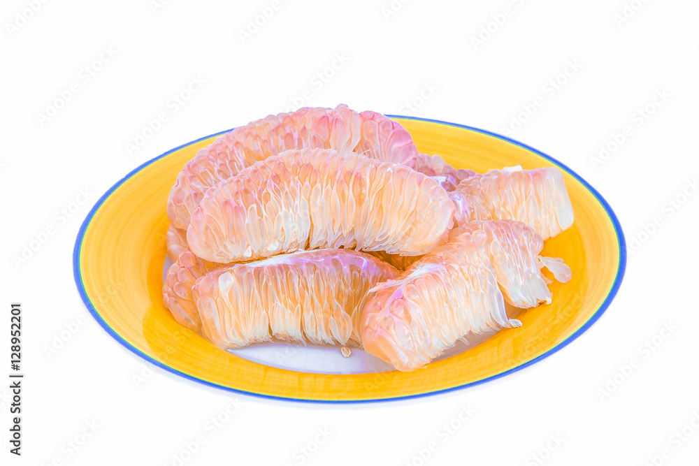 Thailand pomelo fruit on the plate orange and white background. Thailand pomelo fruit on the plate orange and white background.
