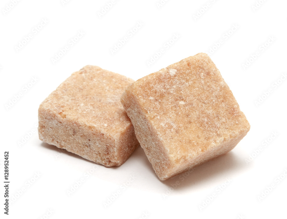 Brown sugar cube isolated on white background
