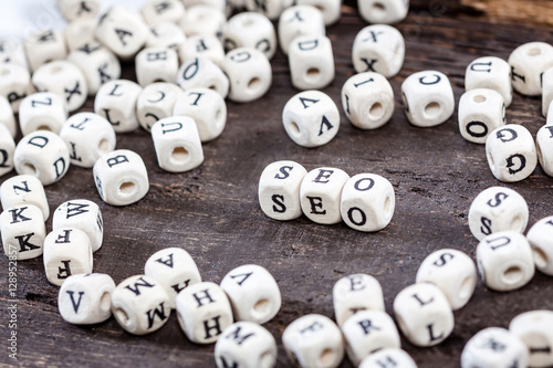 Word SEO on old wooden table.