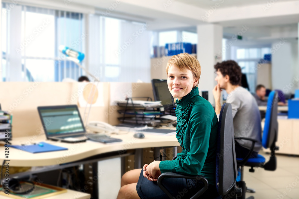 Fototapeta premium Business woman in the office workplace for your laptop