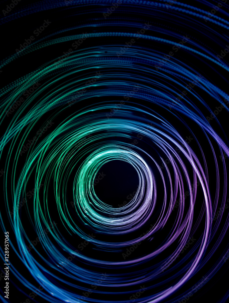 Colorful abstract trails of light. Dots, lines and bokeh on dark background. Long exposure. Colorful abstract trails of light. Dots, lines and bokeh on dark background. Long exposure.