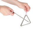 Metal triangle on white background, music instrument